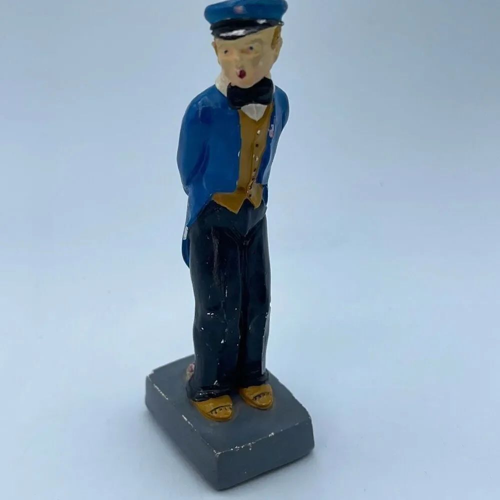 1920’s 30’s chalk ware piece Man holding flowers